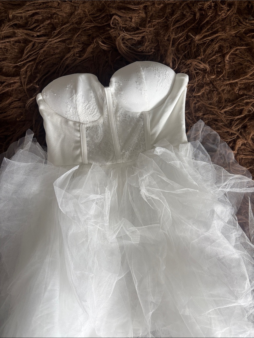 Hi-Lo White Strapless Tulle Bridal Dress. See-thru front bodice. High leg slit.